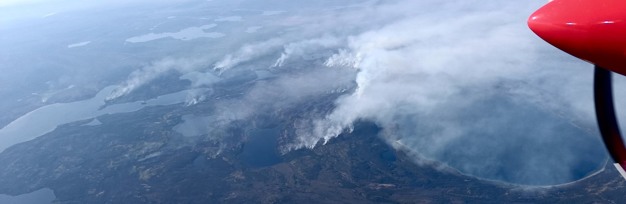 View from airplane of fire in Alberta